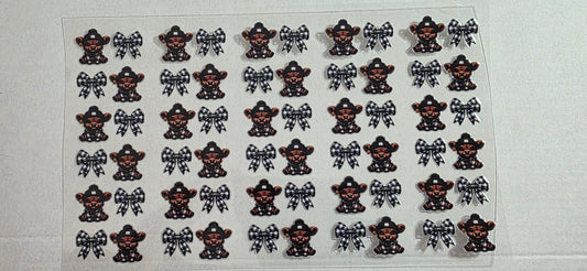 BLACK HIGHLAND COW WITH BOWS