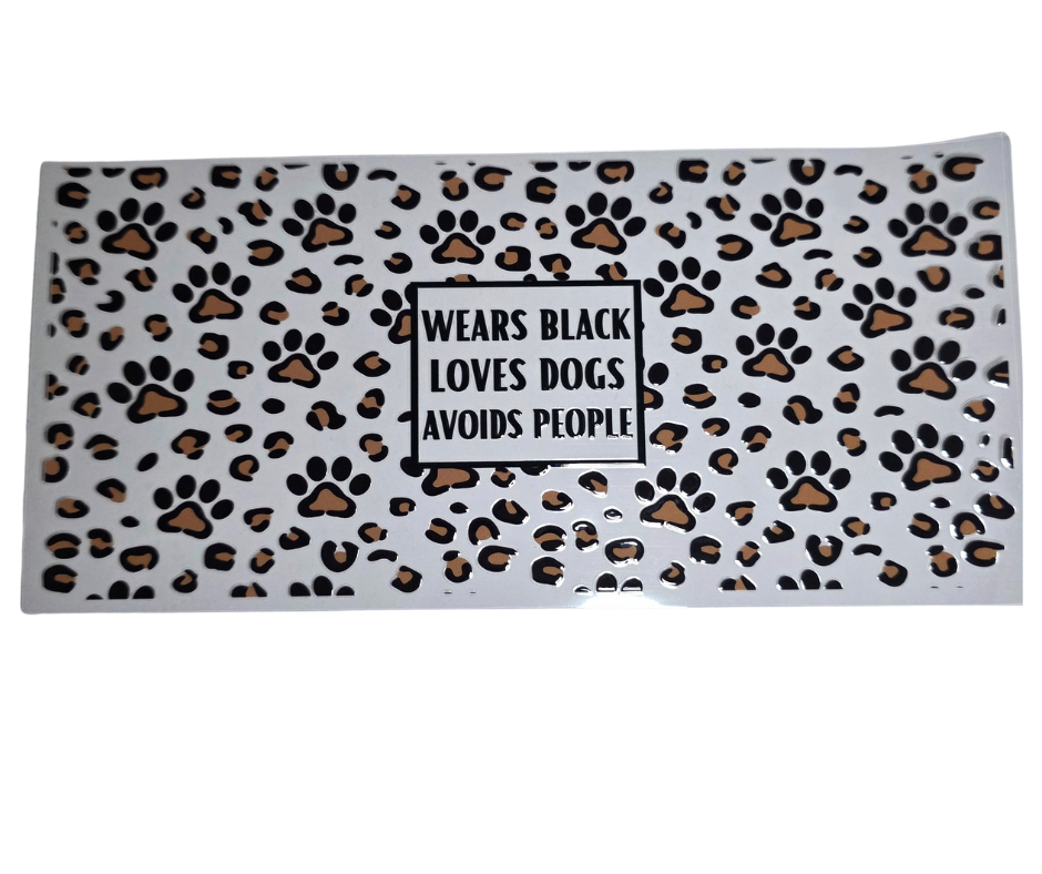 WEARS BLACK LOVE DOGS AVOIDS PEOPLE