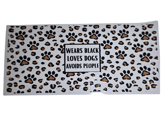 WEARS BLACK LOVE DOGS AVOIDS PEOPLE