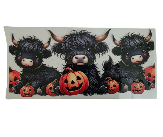 HIGHLAND COW WITH PUMPKINS