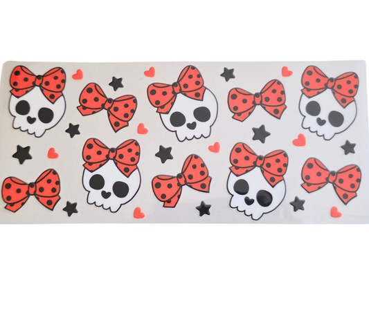 SKULLS WITH ORANGE BOWS